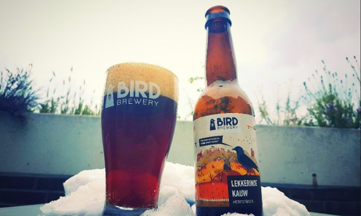 Gevuld glas met flesje Lekkerinde Kauw